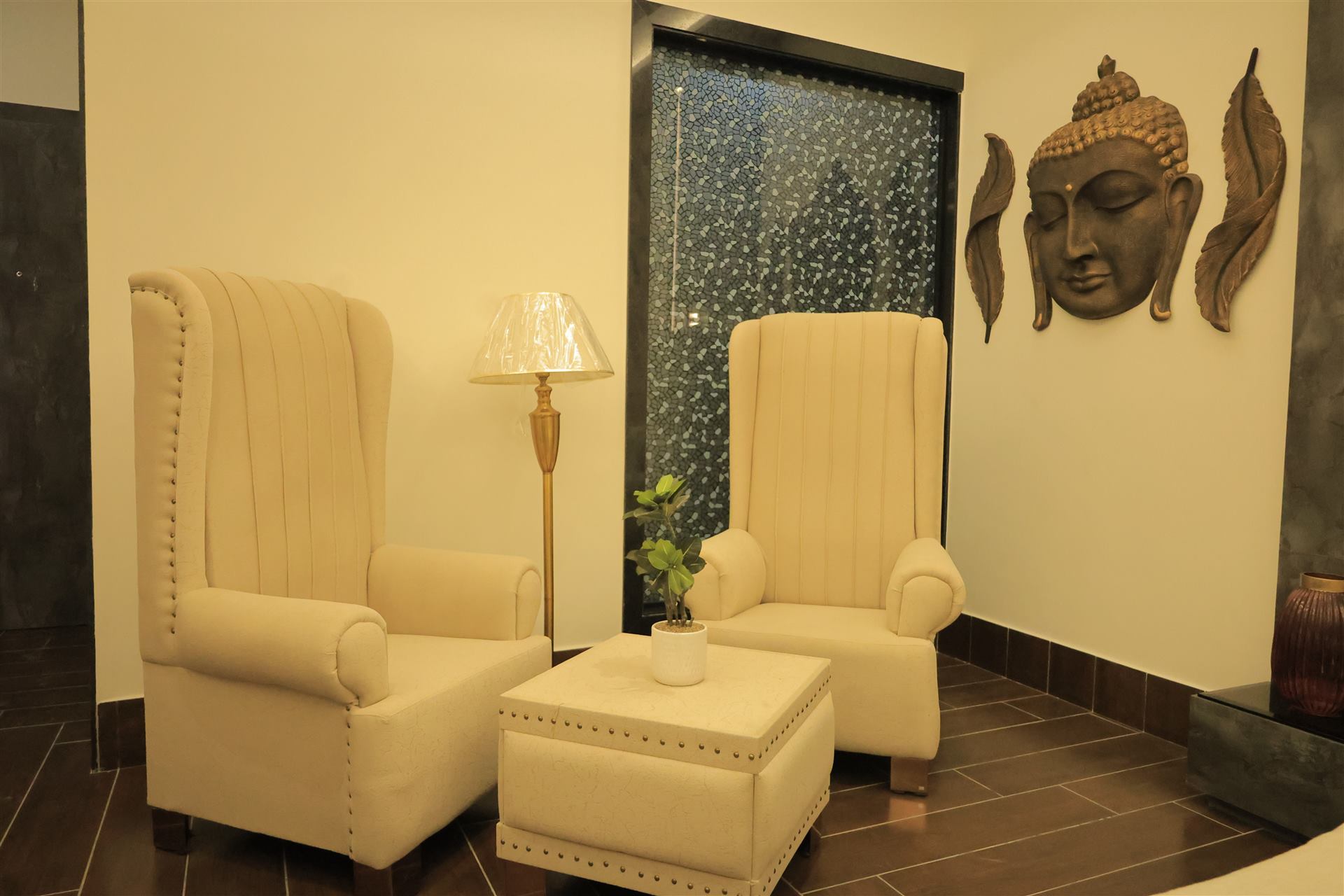 Meditation lounge with wingback chairs
